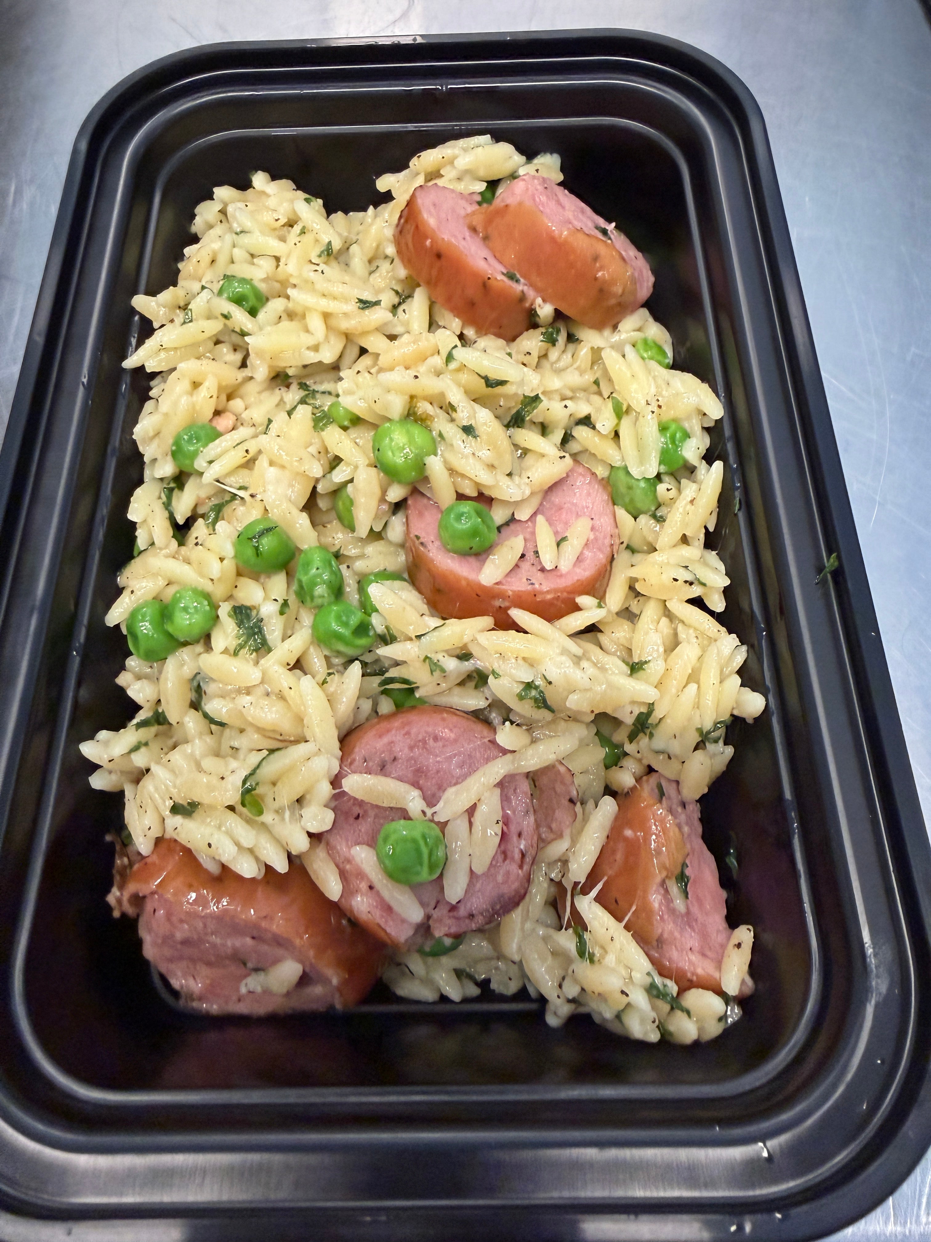 Individual Microwave Parmesan Orzo with Kielbasa and Peas